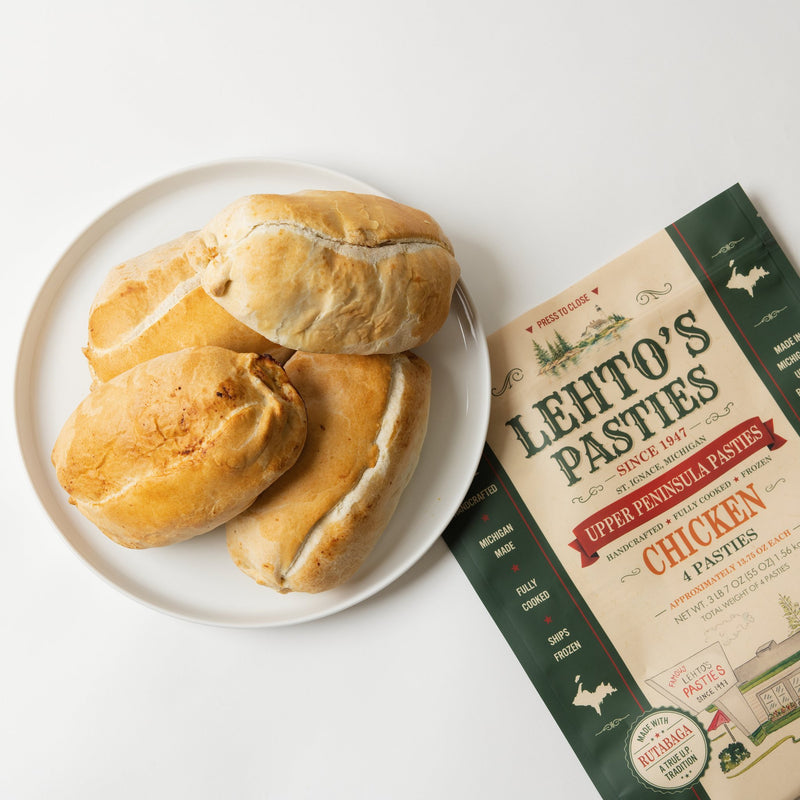 Lehto's pasties on a white plate beside a four-pasty bag of Lehto's Chicken Pasties.